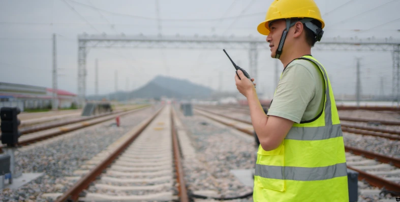 A worker at a railway track. 